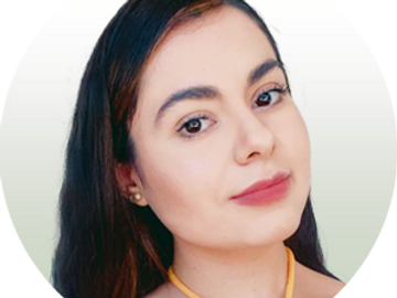 Close-up portrait of a young woman with dark hair and subtle makeup.