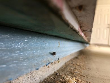 Final phase inspection showing a load-bearing wall that substantially overhangs the foundation