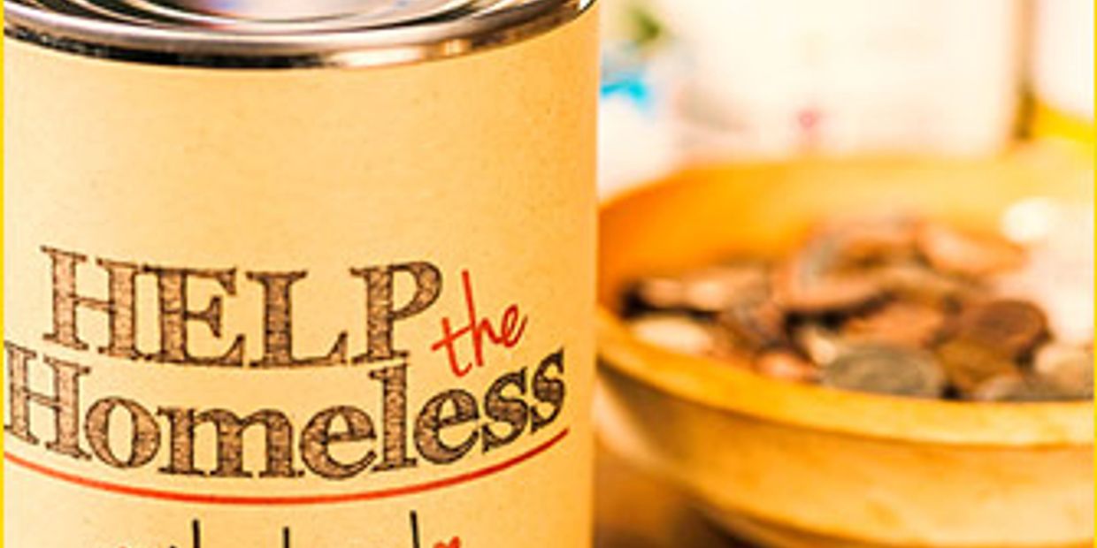 A can for collecting donations to help the homeless.