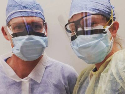 Dr. Tervit and Lynn in their full PPE