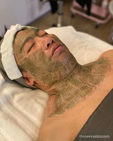 Man having DMK Muscle Banding treatment for sagging jawline & neck. 