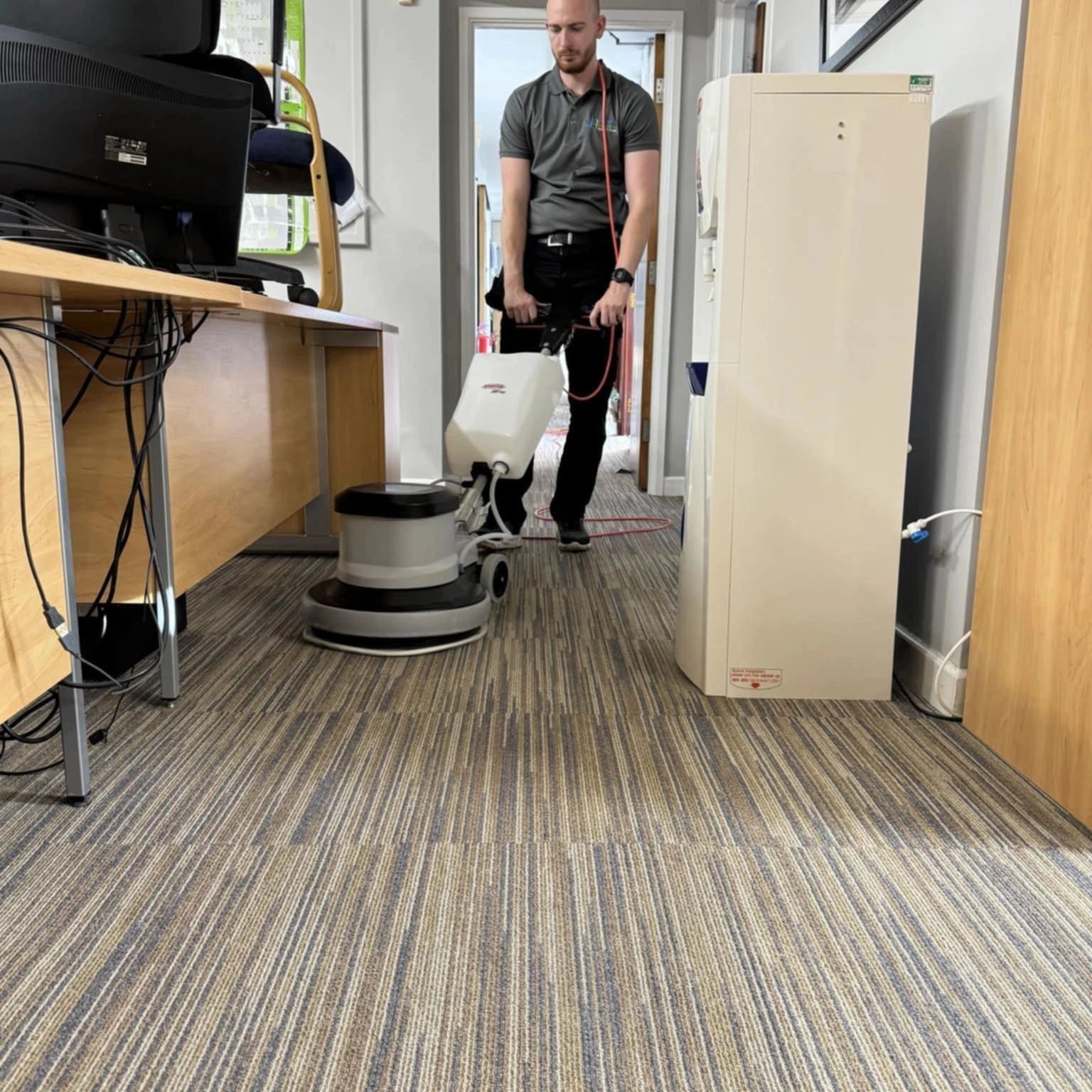 staff cleaning office 