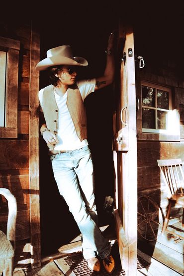 Musician photographed in a cabin in western Washington 