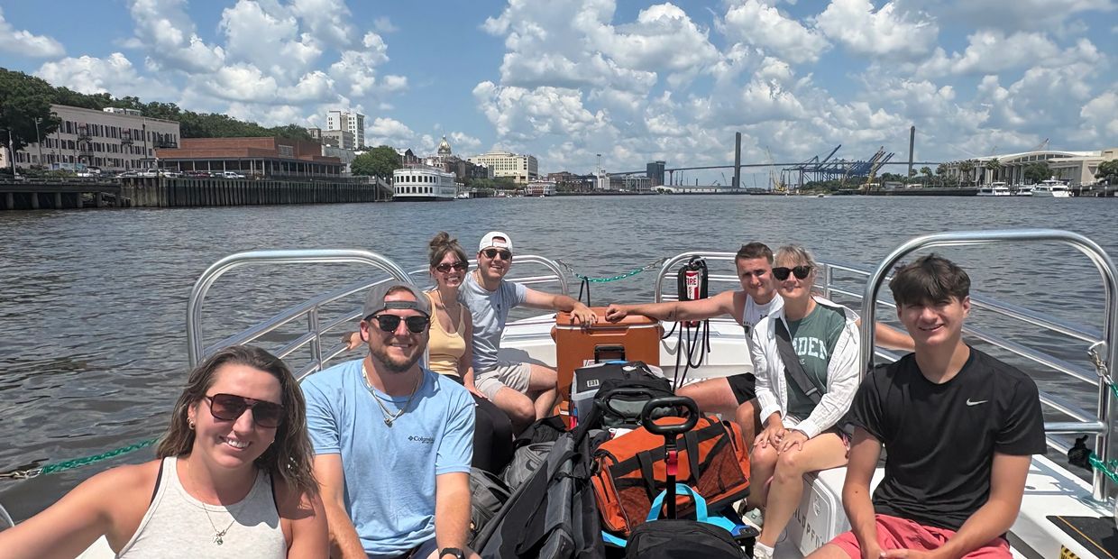  Seven people on one of our boat cruises.