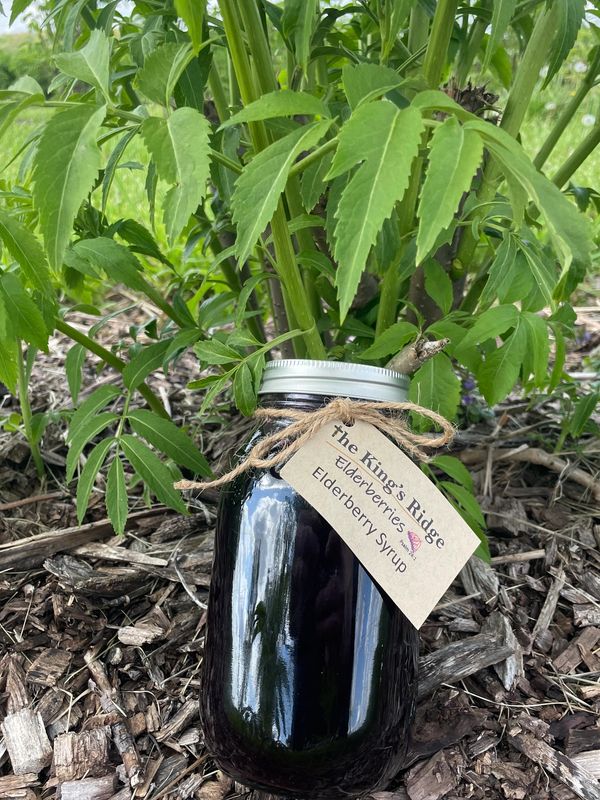Elderberry Syrup made with cold pressed juice from our very own elderberries!
