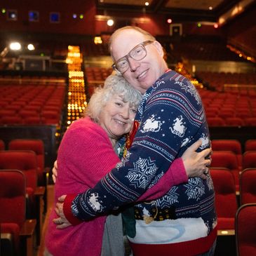 Diane and Freddie hugging