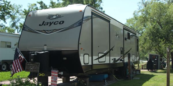 Jayco Travel Trailer with beautiful yard