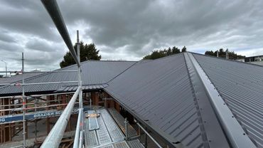 New building roof with scaffolding.