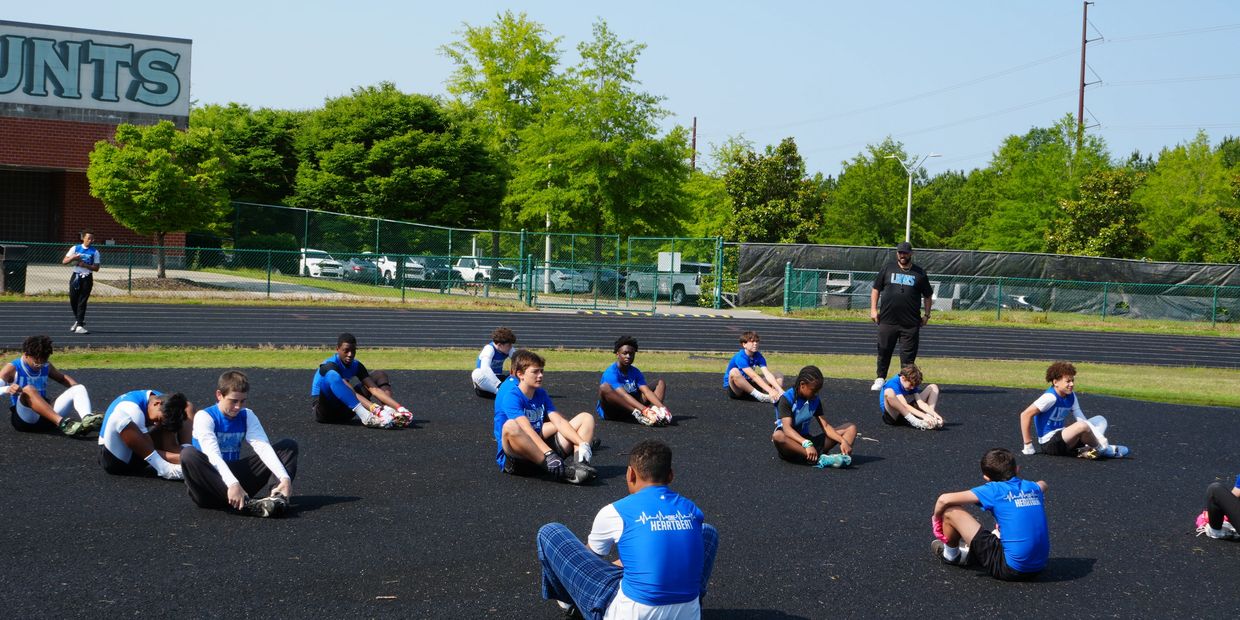 Football Team Stretching
