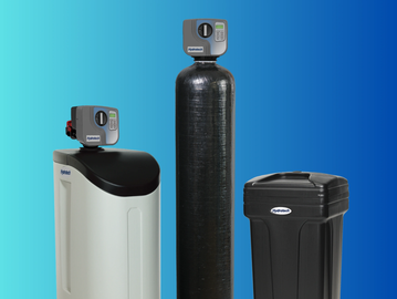 Three water softener systems against a blue gradient background.