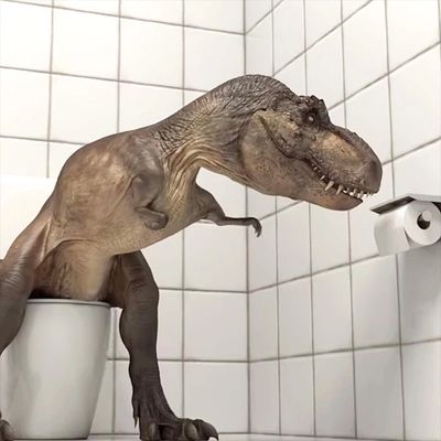 Pooseum T. rex on a toilet with toilet paper