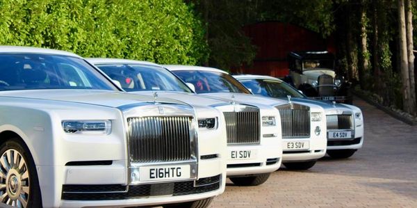 Fleet of Rolls Royce Vehicles 
White Rolls Royce Vehicles 