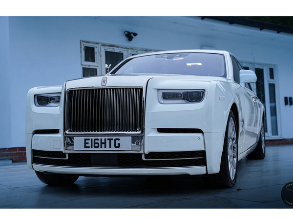 Elegant Rolls Royce Phantom 8 exterior in timeless white.
