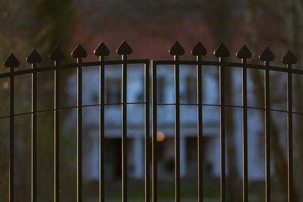 An iron fence gate.