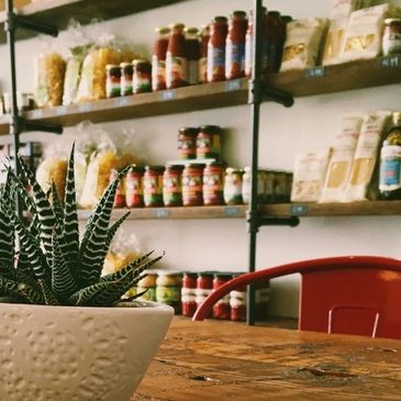 Groceries on shelves at Gigi Blin Market Cafe