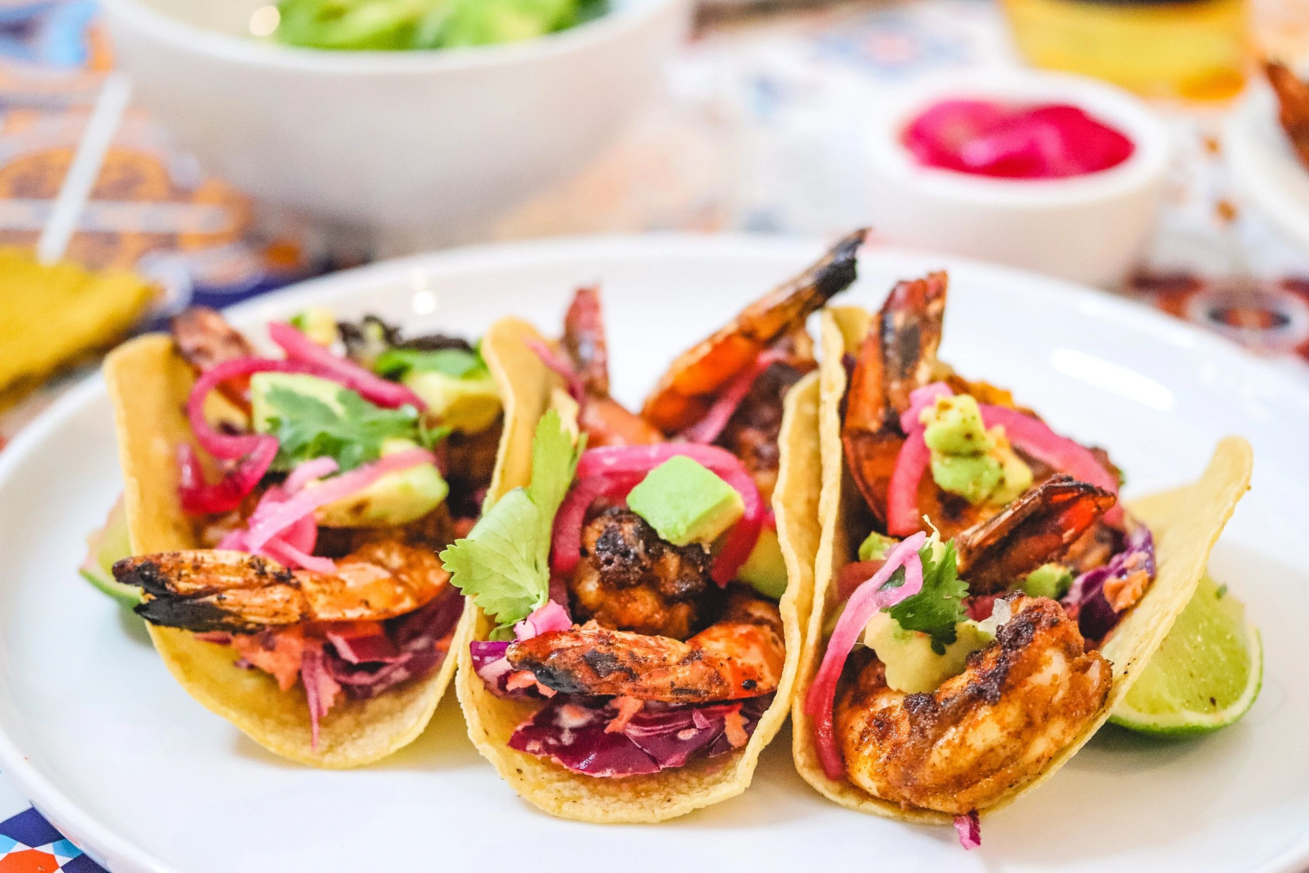 Prawn tacos with coleslaw and pickled onions