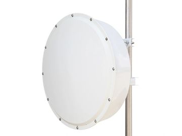 White circular outdoor antenna on a metal pole.