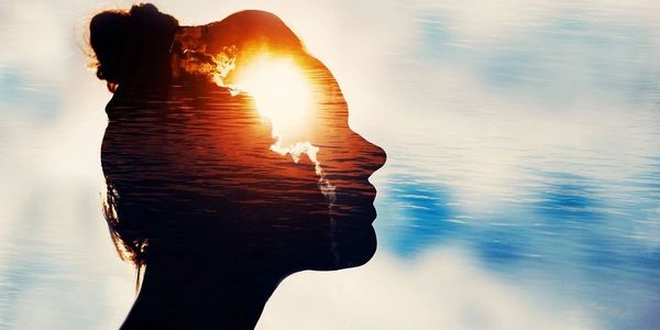 Image of the head of a person with a bright light  part of the Learn Relaxation website