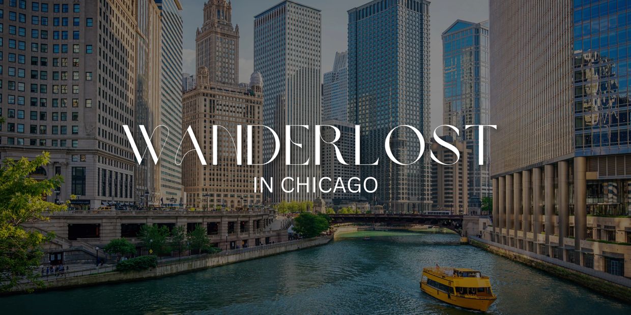Chicago River with a yellow boat and city skyline under 'Wanderlost in Chicago' text.