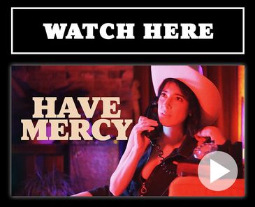 Woman in a white hat holding a phone with text 'Have Mercy' and 'Watch Here'.