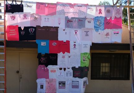 Quilt made from shirts made and worn by cancer walk participants