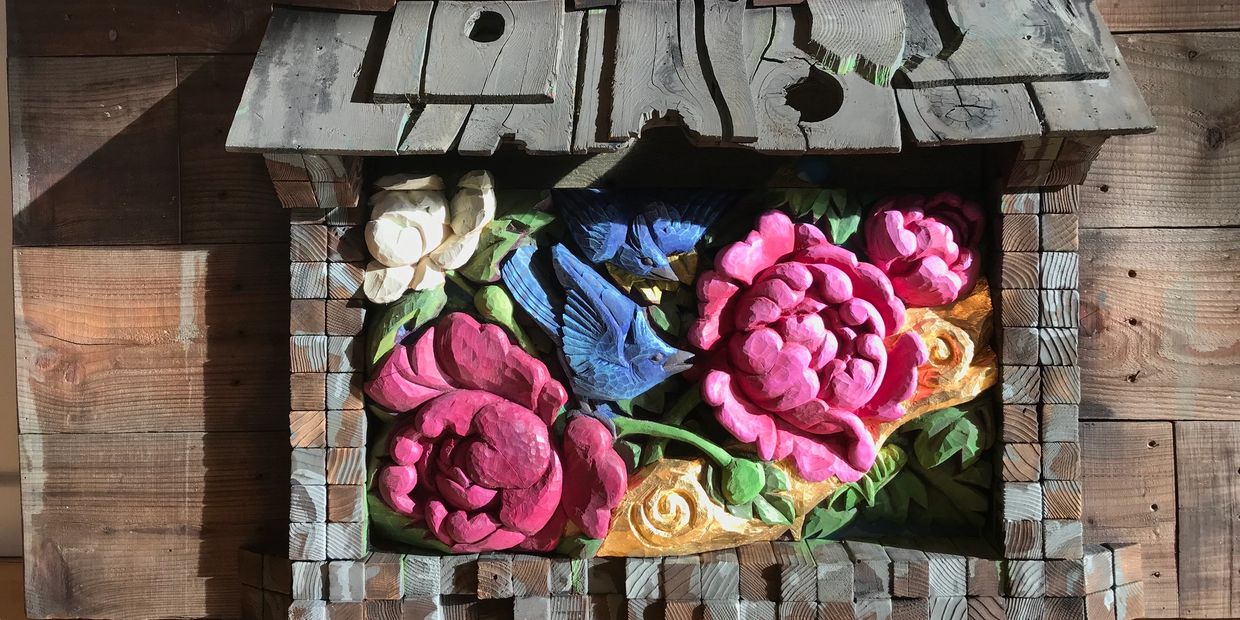 A Garden in the Old Quarter, Kyoto detail  of large relief wood carving