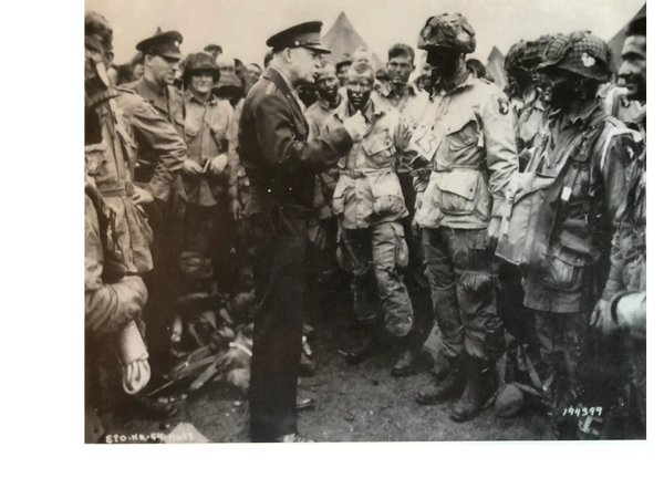 General Dwight D. Eisenhower talks to the troops before their embarkment on D-Day.  We believe that 