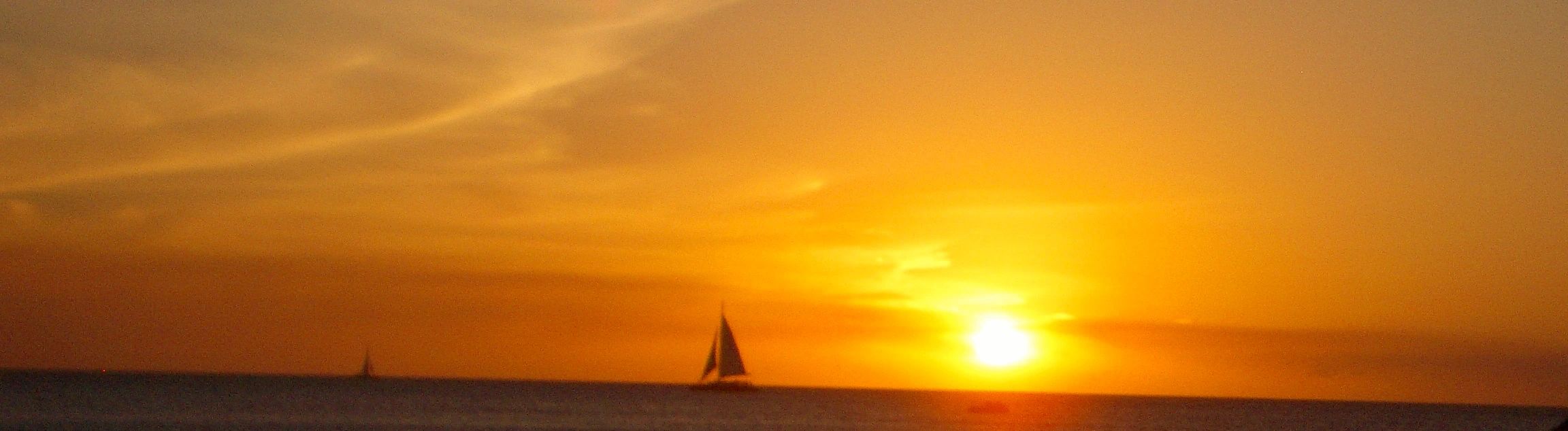 Yoga relaxation reflected in a sunset over the ocean