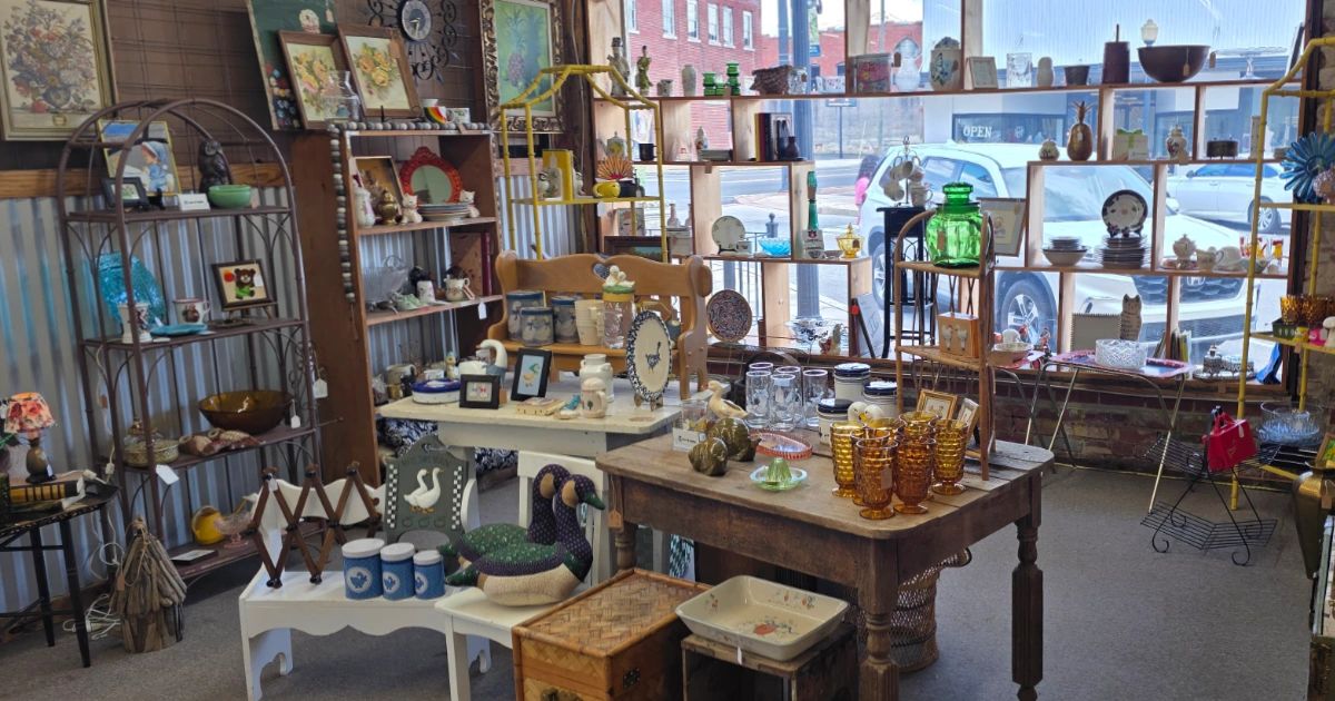 antique mall booth display inside Rustique Relics vintage marketplace