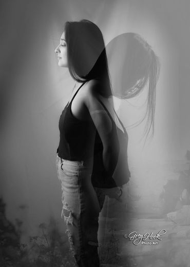 Profile of a woman with a ghostly double exposure effect.