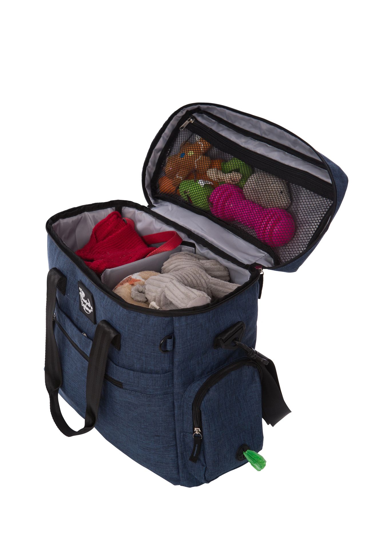 dog travel bag filled with toys, treats, food, blankets, lead, collars
