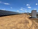 Ambrisolar Farm upgrade looking west to BESS modules and new fixed tilt solar arrays