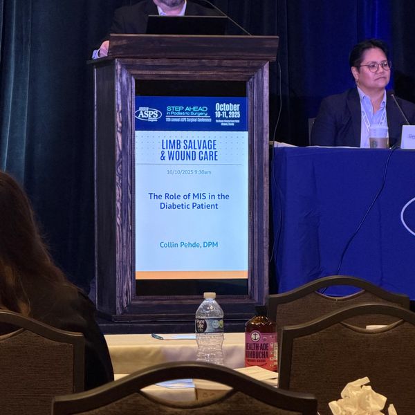 Conference presentation on diabetic patient care in limb salvage and wound treatment.