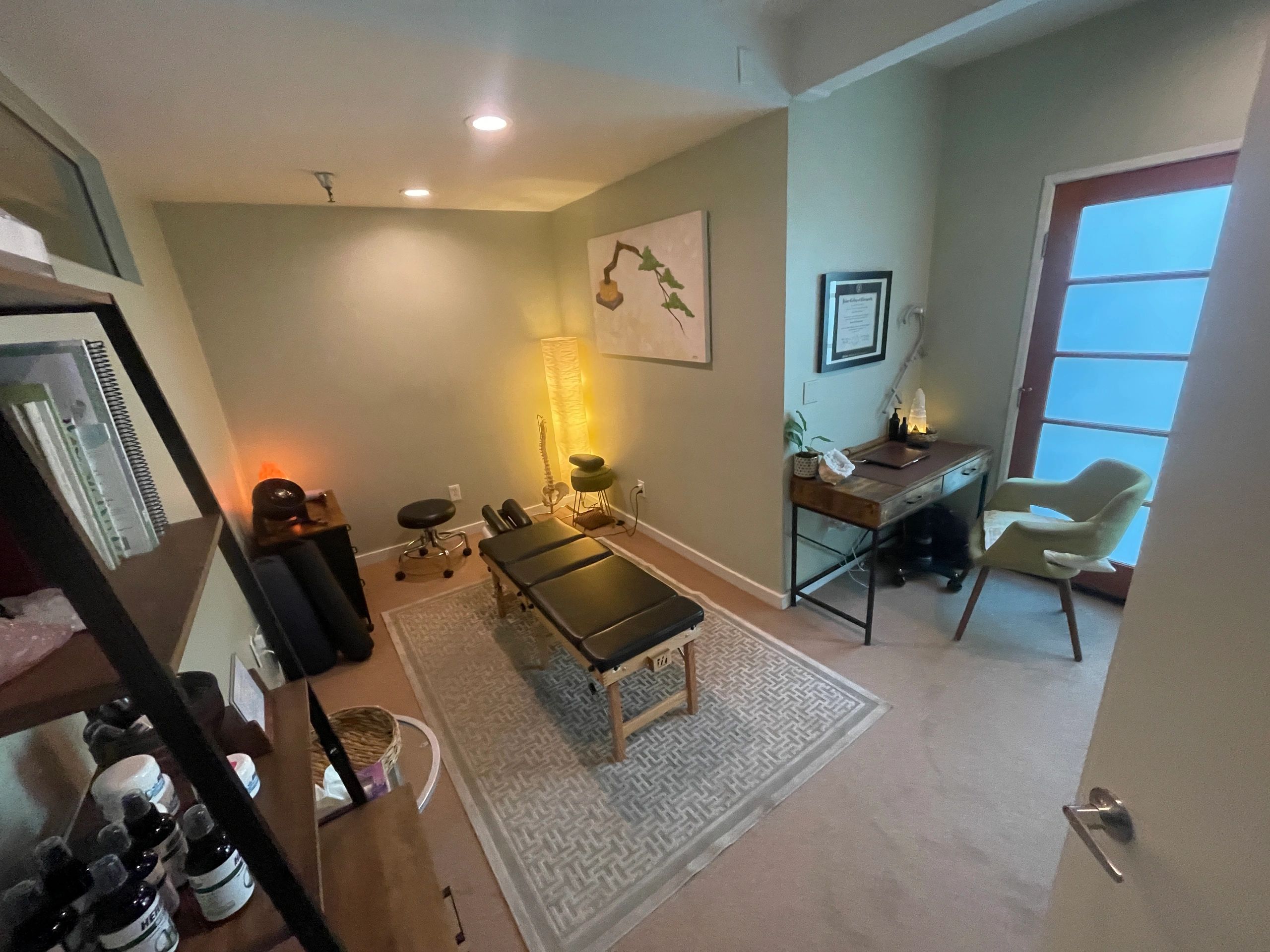 Bonsol Chiropractic treatment room with adjusting table and office of Dr. Jeremy Bonsol in Los Angel