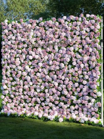 Square flower wall covered with pink roses.