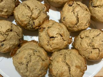 Freshly baked spicey fruit puff muffins.