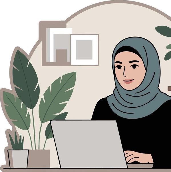 A woman in a hijab working on a laptop with plants nearby.