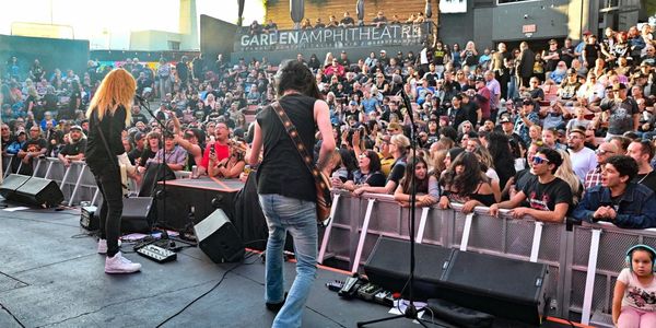 Metallifornia performing live at Garden Amphitheatre with an engaged crowd.