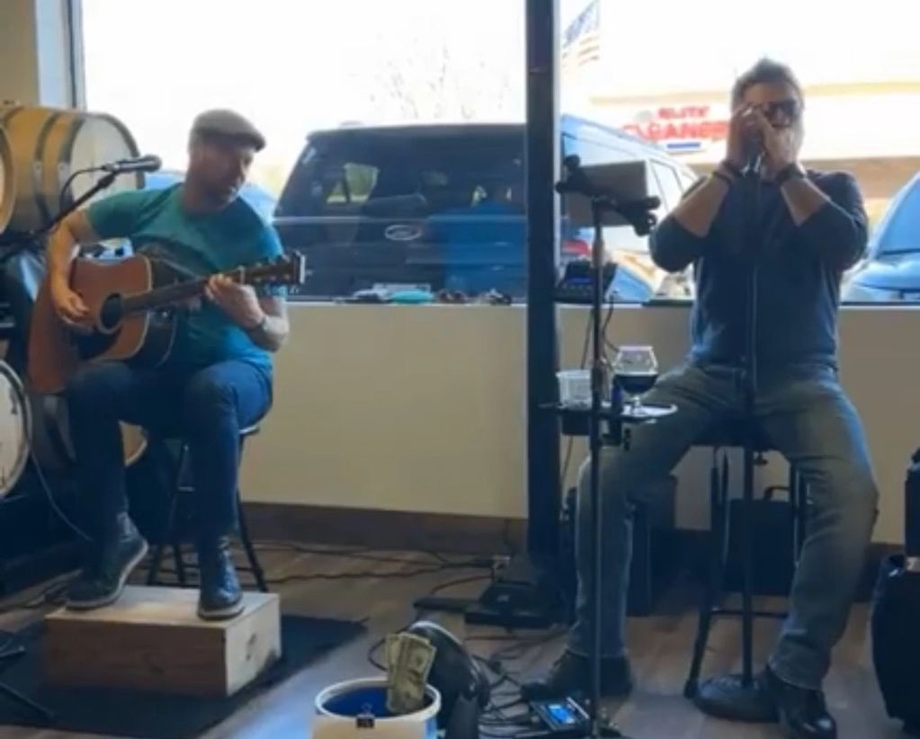 Guitarist and Harmonica player 
performing live music at Four Circles Brewery in Brighton MI 