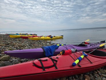 Sea kayaks on a beach