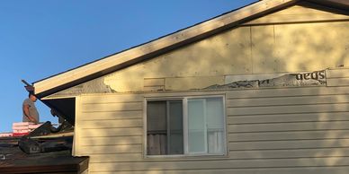 Damaged vinyl siding. Wind damage. Siding repairs. Siding replacements. Siding in Colorado Springs. 