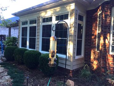 back of home where Windows with Transoms were installed by WindowMaxx