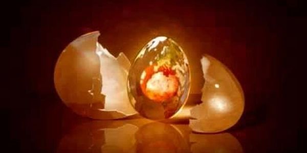 Cracked egg with glowing gem inside