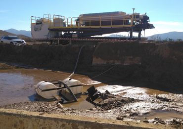 Slurry pond, sludge dewatering, wastewater management