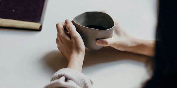 Two people having coffee