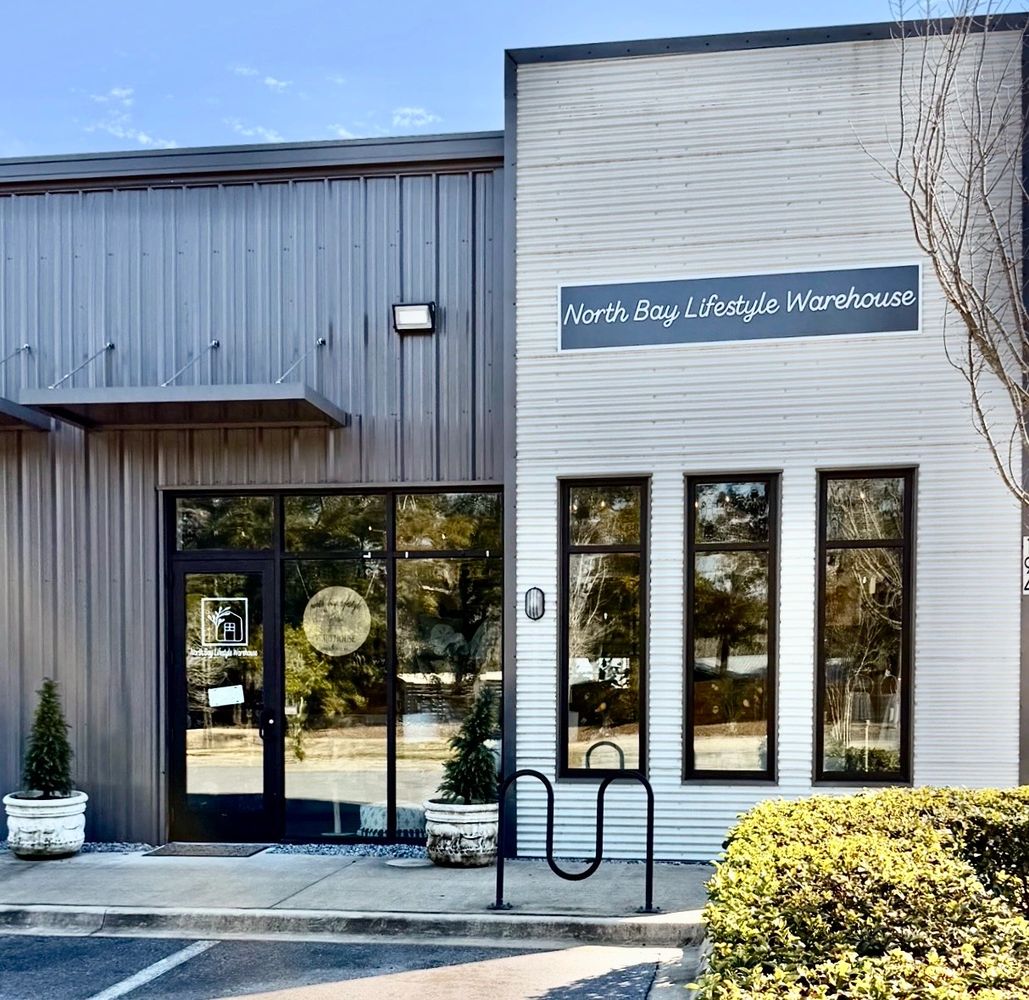 Exterior of North Bay Lifestyle Warehouse with modern design and greenery.