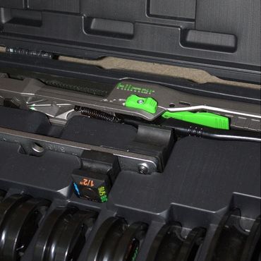 Hilti utility knife stored in a tool case with other tools.