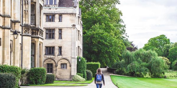 A student walking through Cambridge University