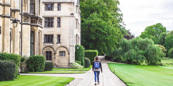 A student walking through Cambridge University