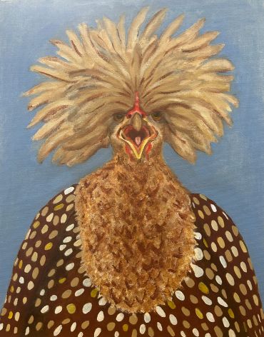 A bird with a large, feathery crest and patterned body.